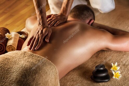 Therapist applying deep tissue technique.
