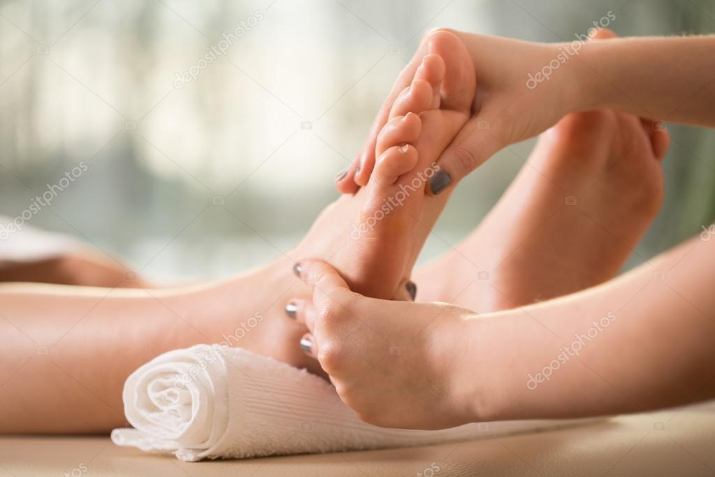 Reflexology foot treatment.