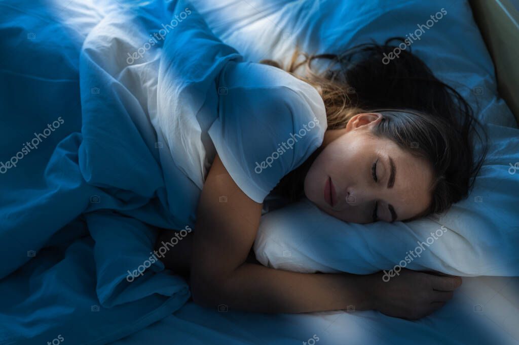 Cozy bedroom scene suggesting restful sleep.