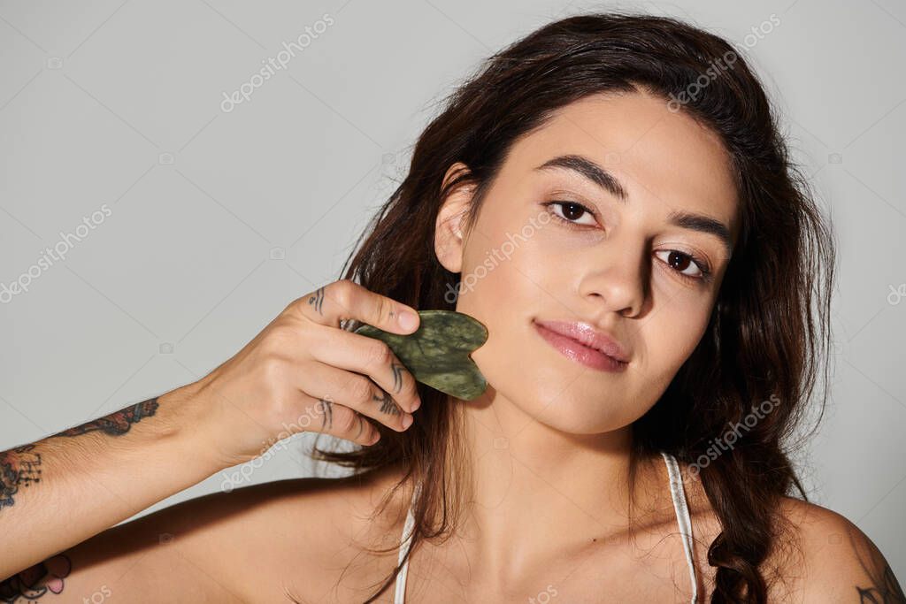 Therapist using gentle, gliding strokes.